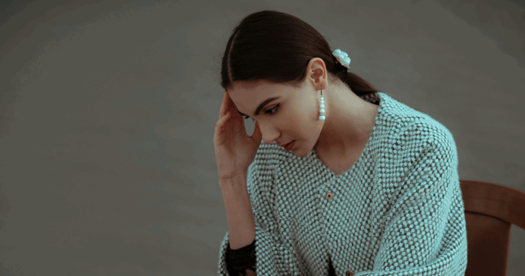 Woman experiencing Suboxone withdrawal symptoms, highlighting coping mechanisms for addiction recovery and mental health support.